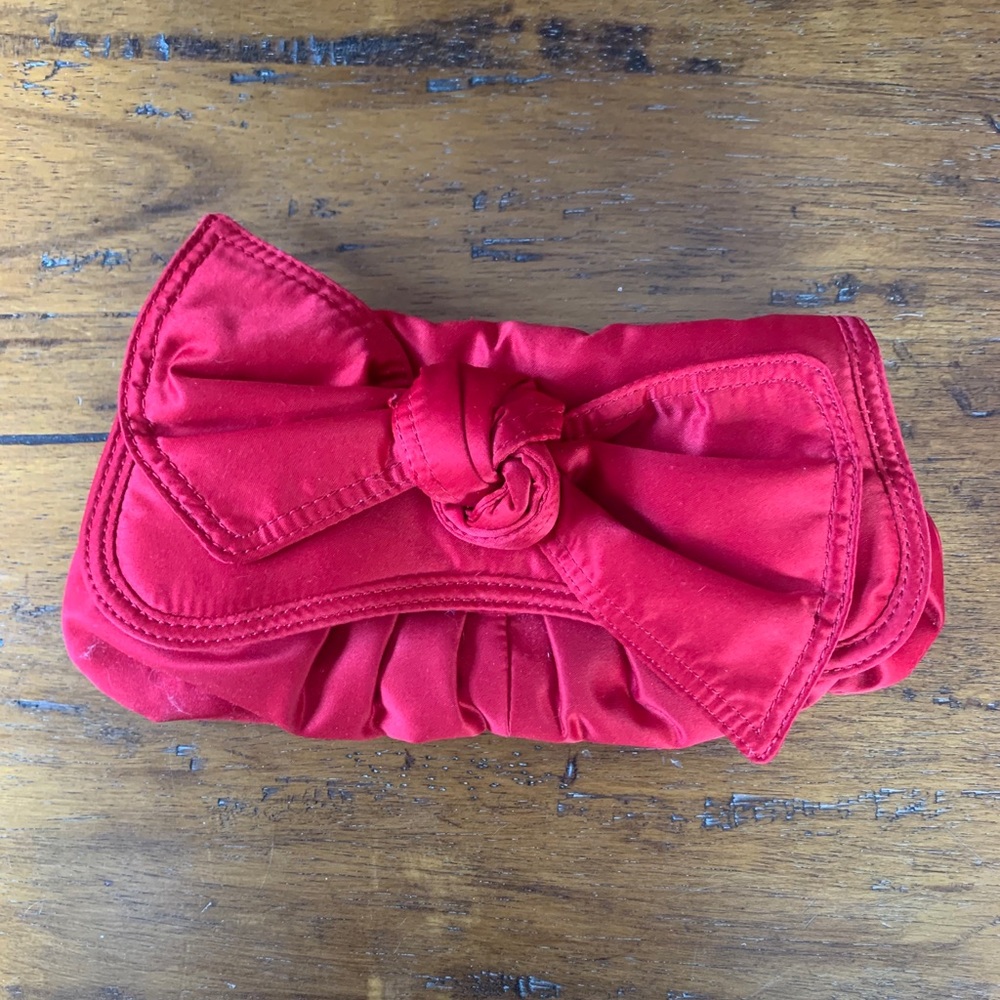 Red satin tie clutch with wrist strap